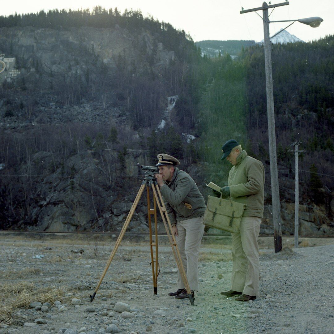 Two colleagues reviewing an editorial photo layout together