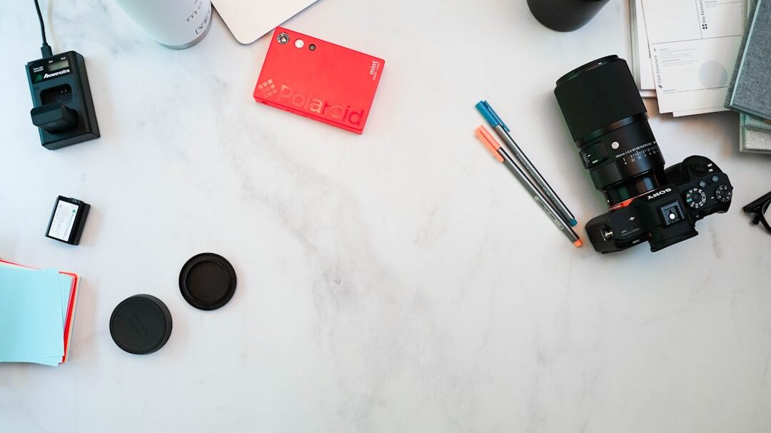 Professional camera and photography equipment flat lay