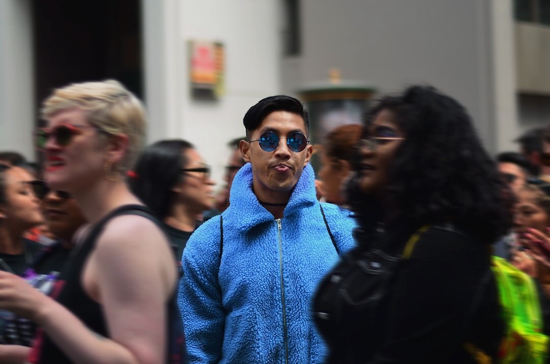 Fashion week runway show with audience in the foreground